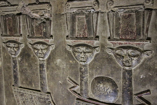 Mysterious murals on the walls of the Temple of Dendera Hathor , near the city of Ken