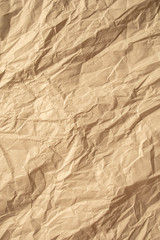 Brown crumpled paper close up texture background Vertical