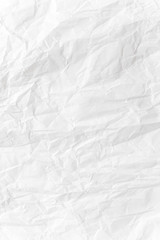  White crumpled paper close up texture background Vertical