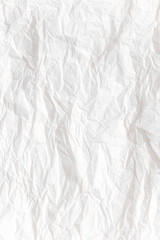  White crumpled paper close up texture background Vertical