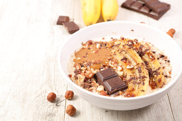 oatmeal- porridge with banana, chocolate and nuts