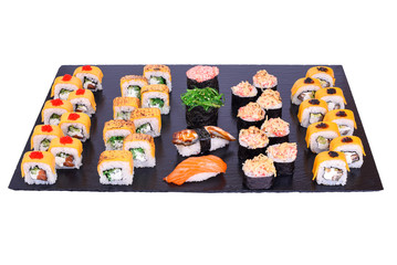 sushi set Cheese rolls with fresh fish and cheese inside . Rolls on black stone isolated on white background. Sushi menu. Japanese food.