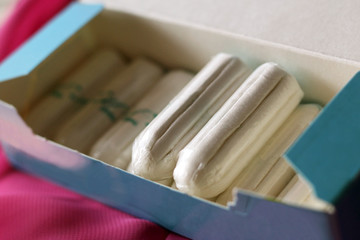 Women's sanitary tampons in the box, hygiene products.