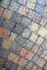 masonry wall paving stones as a background close up