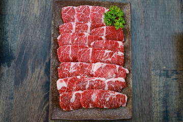 Sliced ​​beef in a saucer