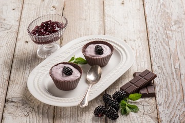 homemade blackberry chocolates with meant leaf