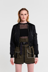 Fashion shooting in studio . Professional model , fashionable clothes and style, new collection. stylish look.