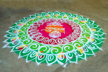 Traditional indian wedding ceremony in Hinduism : Rangoli design for welcome