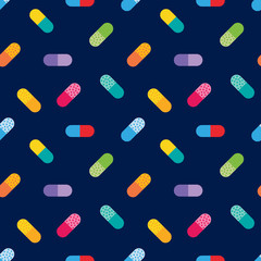 Vector colorful pills, medications and supplements seamless pattern background.
