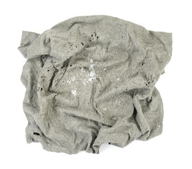 Obraz premium Old dirty torn rag isolated on white background. Cleaning rag.