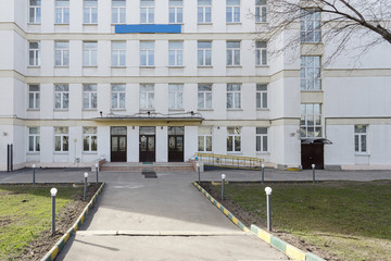 School building with an empty courtyard.