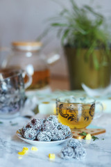Tea and cookies on the table.