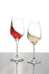 Crystal glass with red and white wine