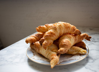 Home baked croissants on a kitchen table