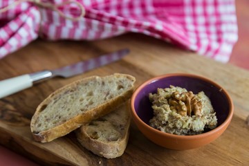 Depiction of Healthy breakfast with avocado sauce and homemade bread