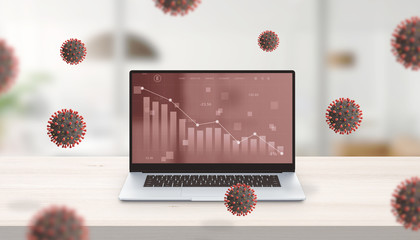 Decline in the stock market value shown at chart on laptop computer. Office desk concept surrounded...