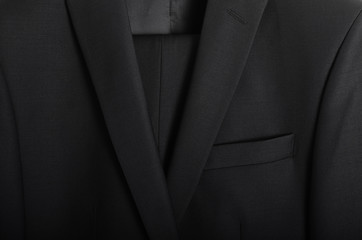 Detail from a dark gray men's jacket