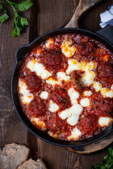 Meatballs with tomato sauce and mozzarella cheese