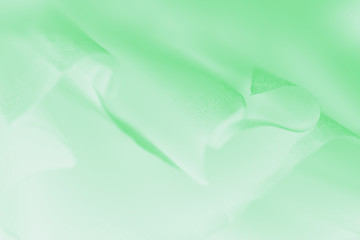 Pale delicate soft green gradient abstract background. Fabric background