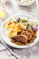 Braised pork loins with onion sauce