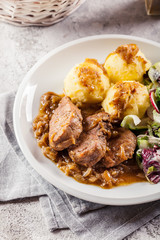 Braised pork loins with onion sauce