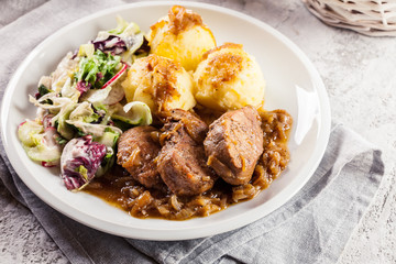 Braised pork loins with onion sauce