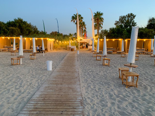 Beach bar Monopoli near Bari at sunset