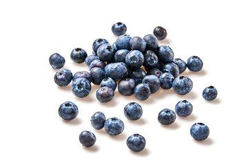 Blueberry isolated on white. Fresh blueberry closeup, healthy diet nutrition concept. Ripe organic bilberry, vegan meal. Juicy blueberries background.