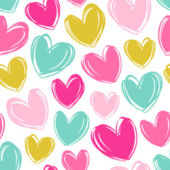Seamless vector pattern with cute colorful hearts.