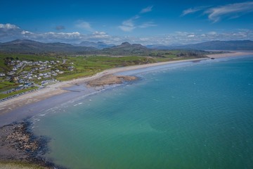 Aerial view of Criccieth Beach and Snowdonia Mountains, Wales, UK
