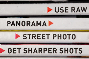 Use raw panorama street sharper Macro close up view of words in black text across horizontal lines abstract background