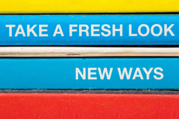 Obraz premium Take a fresh look text rusty close up view in vivid colorful abstract background