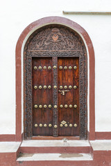 Traditional style wooden door in Stone Town, Zanzibar