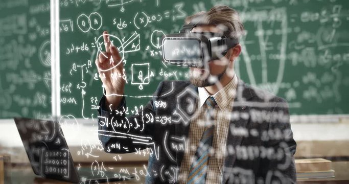 Portrait of bearded teacher wearing virtual reality headset and using hologram math screen