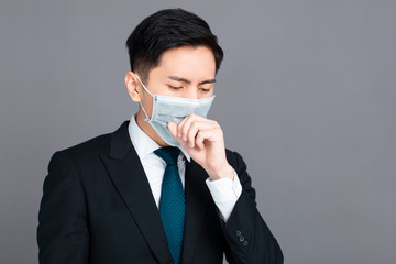 young man wear medical mask and  cough