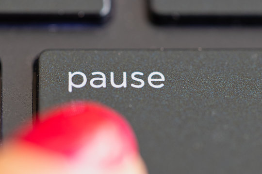 Keyboard button pause close up. take a break