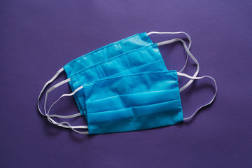 Medical respiratory bandage face on green background. prevention of the spread of virus and...