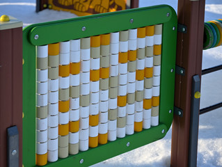 
game of spinning rollers in a city park