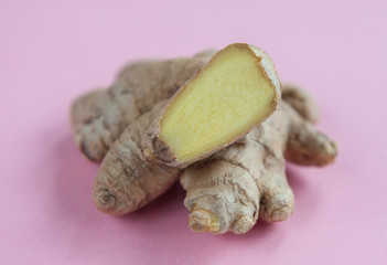 ginger close-up on a pink background. Immune support during an epidemic