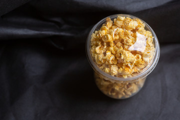 Popcorn in a large bucket.