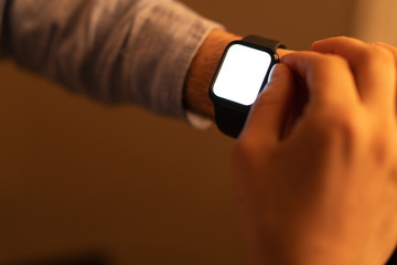 Close up of Businessman's hand looking at hand watch