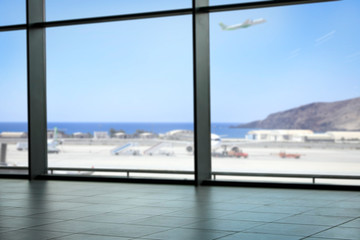 Summer background of airport and big window 