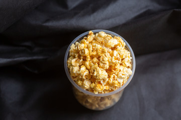 Popcorn in a large bucket.