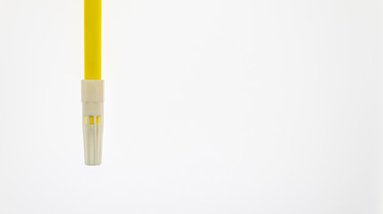 a yellow felt tip on white background