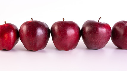 Big fresh red apples on white background