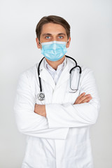 Handsome physician with mask