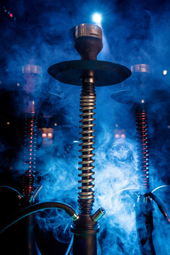 three hookah in the smoke