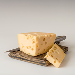 Cheese on a wooden board. Appetizing appetizer. Selective focus.
