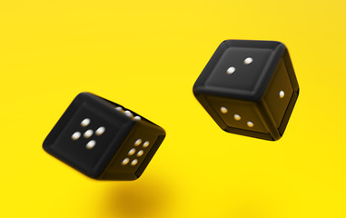 Dice from the casino. Thrown black dice close-up on a white background.