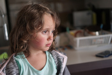 The 4 year old girl is about to cry, copy space